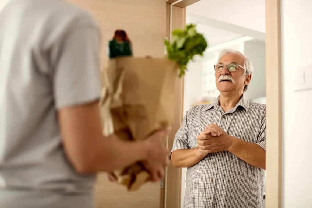 helping elderly shopping